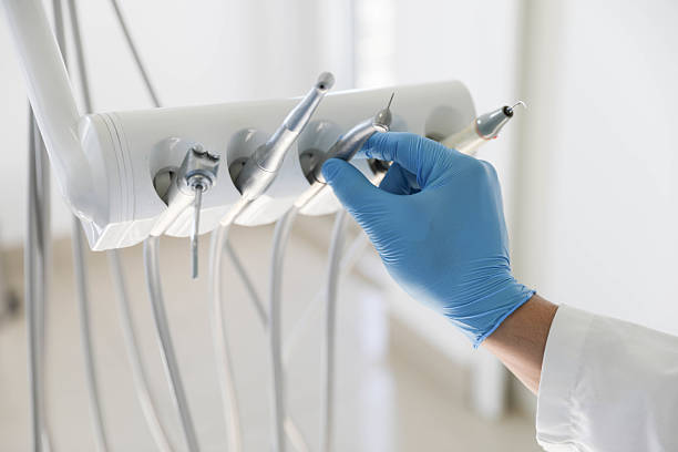 Professional Wisdom Tooth Removal technician working in Tomball, TX